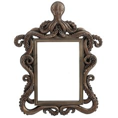 an ornate mirror with an octopus design on the front and bottom frame, is shown