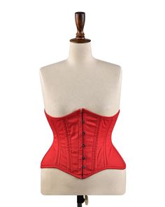 * Hey there! Take a look at our amazing Cotton Underbust Corset! * It's a special, handmade creation that can make your body look curvier. * This corset has strong steel bones, which means it's really sturdy. You can     lace it up tightly to train your waist and make it smaller. * No worries about putting it on or taking it off--it has a front busk that     makes it super easy. * Inside the corset, there are springs and steel rods that give you great    support and a comfy fit. * And guess what? The corset is lined with soft black cotton fabric, so it's    extra cozy to wear it all day long. * You can wear this versatile corset over a blouse or top to add a fancy touch    to your outfit. It covers your stomach and hips nicely, giving you a    flattering silhouette and making your tummy lo Cotton Corset, Waist Shapers, Lace Tights, Underbust Corset, Waist Training, Corsets, Comfy Fits, Soft Black, Cotton Twill