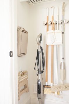 a room that has some cleaning supplies on the floor