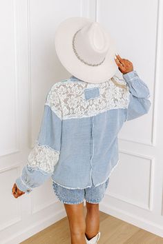 - Express your unique style with this adorable top! Trendy details and delicate lace cutouts give it a sweet, laid-back vibe. Whether you are on your daily coffee run or road tripping across the countryside, this cutie is sure to keep you looking stylish! - Unlined chambray material with subtle fading and frayed seam accents - Cross stitch lace cutouts with a floral design - Ivory, purple, blue, and green hued paisley accent material on the upper bodice and pockets - A collared neckline - A butt Chambray Jacket, Concert Fashion, Coffee Run, Essential Dress, Summer Soiree, Lace Cutout, Crop Top Sweater, Crop Top Blouse, Curve Dresses