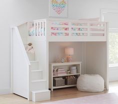 there is a loft bed with stairs to the top