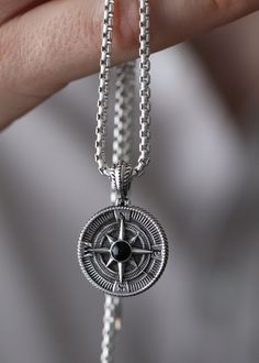 Dare to navigate the unknown with a Silver Compass Pendant! Crafted from solid silver, this stunning pendant guides you to the path of exploration and discovery. Follow your intuition and go forth on your own adventure -- it's where the real magic happens! Sterling silverPendant: 22 x 22 mmPlease note: Pendant only; chain sold separatelyShown with: Round Box Chain Weight: Approximately 7.3g Processing time 1-3 business days Luxury Silver Compass Design Jewelry, Mens Necklace Compass, Luxury Compass Design Pendant Jewelry, Symbolic Compass Pendant Jewelry, Male Compass Necklace, Follow Your Intuition, Viking Aesthetic, Compass Necklace Silver, Real Magic