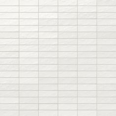 a white tile wall that is very clean and ready to be used as a background