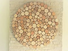 this is a wall decoration made out of wood slices