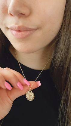 Our medallion cross necklace is perfect for everyday, special occasions, religious events gifts for mom, wife, anniversaries, and other special occasions. This beautiful shimmering piece is 14K gold filled and looks amazing layered, or dainty all on its own. W H Y ∙ Y O U ' L L ∙ L O V E ∙ I T• It's delicate and can be worn every day• A classic special piece you will surely treasure• High-quality materials and attention to detail• All jewelry has a 1-year guarantee (see policies)P R O D U C T • Luxury Spiritual Medallion Coin Necklace, Yellow Gold Cross Necklace With Coin Pendant, Yellow Gold Monogram Medallion Necklace, Spiritual Engraved Gold-plated Medallion Necklace, Luxury Coin-shaped Medallion Necklace With Large Pendant, Gold Cross Necklace, Event Gifts, Medallion Necklace, Gold Cross