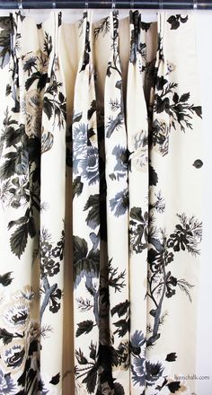 curtains with black and white flowers on them