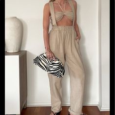 Perfect For Vacation And Hotter Weather! Chic Overall Bottoms For Vacation, Chic Vacation Overalls, Casual High-waisted Jumpsuits And Rompers For Day Out, Casual High-waisted Jumpsuits For Day Out, Summer High-waisted Jumpsuits And Rompers For Day Out, High-waisted Summer Jumpsuits And Rompers For Day Out, High-waisted Jumpsuits And Rompers For Summer Day Out, Casual Beige High Waist Jumpsuit, Chic Neutral Jumpsuits And Rompers For Spring