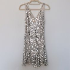 Free People Shimmy Sequin Mini Dress. Drop Waste, Fully Lined, Beautiful Silver Sequin Detail. Worn Only 2 Times Then Dry Cleaned. Great Condition. Perfect For Holiday Parties And New Year’s Eve, Brides For Their Bachelorette Or Wedding Exit Or After Party, Or Even As A Flapper Costume For A Roaring 20’s Or Gatsby Party. Smoke Free Home. Sequin Fringe Dress, Wedding Exit, New Years Eve Wedding, Roaring 20, Flapper Costume, Wedding Exits, Gatsby Party, Fringe Dress, New Year’s Eve