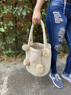 Pompom Tote Wayuu Bag in natural Color , Large Size perfect for beaches high quality Wayuu mochila bag totes.-Bag size : 30x26cmHandle:35cm point drop -⭐️Shipping:DHL :• USA, Central & North America: 2-3 Business Days  • Rest of The World: 4-6 Business Days -Wayuu mochila bags beach totes beach bags top handle bagsPompoms Beach basketWayuu California Wayuu miami Beach Totes, Beach Basket, Mochila Bag, Totes Bag, Wayuu Bag, Top Handle Bags, Beach Bags, Beach Tote Bags, Beach Tote