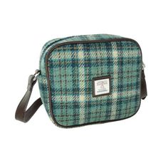 Harris Tweed Square 'Almond' Mini Bag This sophisticated square mini bag, known as 'Almond', is a fabulous day time accessory. Because it is handwoven with genuine Harris Tweed, it is very hard wearing and will last for many years and still look good. In addition, it offers versatility as the shoulder strap is adjustable. The 'Almond's' zipped interior provides security for your valuables. finally it has a nice small pocket on the back. This smart mini bag will hold all your daily essentials. Di Winter Scarf Gift, Tweed Scarf, Cow Logo, Eco Friendly Shopping Bags, Mini Messenger Bag, Scottish Jewellery, Ladies Bags, Outer Hebrides, Scottish Gifts