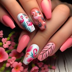 Nails with a light pink or coral base color, perfect for a tropical theme. The design includes white or bright pink flamingo silhouettes on several nails. Additional tropical elements like flowers and leaves in complementary colors are painted around the flamingos, creating a lively and fun tropical scene. Pink Tropical Nails, Hawaii Nails, Tropical Elements, Spring Nail Designs, Brighter Days, Nails Set