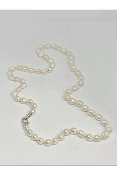 Dive into the world of timeless elegance with our blog on "How to Wear & Style Pearls." Discover creative tips and fashion inspiration to elevate your look. Pearls are a classic statement that never goes out of style! Click to unveil the secrets. ✨ #PearlFashion #StyleTips #ClassicElegance #JewelryInspiration #FashionBlog Types Of Pearls, How To Wear Pearls, Layered Pearl Necklace, Wear Pearls, Pearls Jewelry, Simple Pearl, Pearl Collection, Pearl Brooch, South Sea Pearls