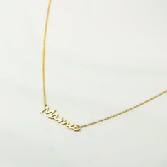 "D E S C R I P T I O N Silver Name Necklace *Mama Necklace * Material: High Quality Solid 925 Sterling Silver * Dimensions: Depending on your font choice, height sizes range from 30 mm to 40 mm lowercase. * Finish: Sterling Silver ∙ 18K Gold ∙ Rose Gold ∙ * All our jewelry is custom made by hand with Love and Care in our workshop * The length option is the TOTAL chain length . If you order an 40 CM plus a 3cm extesnsion\" 1\" extension * All items are nicely packaged ready to gift in elegant jew Custom Name Pendant Necklace For Mom, Meaningful Charm Necklace For Anniversary And Mother's Day, Mother's Day Name Charm Necklaces For Mom, Mother's Day Gift Names Charm Necklaces, Personalized Pendant Necklace For Mother's Day, Mother's Day Name Pendant Necklace, Anniversary Hallmark Charm Necklace For Mother's Day, Meaningful Charm Necklaces For Anniversary, Gold Necklace With Names For Mom