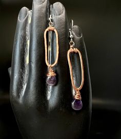 Rustic Amethyst Paper Clip Drop Earrings   ✨ Choose your preferred Earwires ✨ Handmade, Forged, and Hammered Copper ✨ Faceted Authentic Amethyst 💫 Handcrafted using natural materials, these earrings feature the beautiful polished Amethyst gemstone -the February Birthstone. The hammered texture and earthy tones allow the delicate purple shades to pop-making these a tasteful boho choice.   All items are shipped ready to gift or enjoyed as a treat. Feel free to reach out if you have any questions.  See more styles here! https://www.etsy.com/shop/BinkStudio?ref=profile_header&section_id=35372010 Amethyst Long Drop Earrings For Pierced Ears, Handmade Amethyst Drop Earrings, Handmade Amethyst Long Drop Jewelry, Handmade Long Drop Amethyst Jewelry, Nickel-free Amethyst Dangle Earrings, Nickel-free Amethyst Long Drop Jewelry, Nickel Free Amethyst Dangle Earrings, Nickel-free Amethyst Earrings For Healing, Amethyst Natural Stone Dangle Earrings