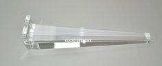 a clear acrylic sign with the words lucio desonine on it