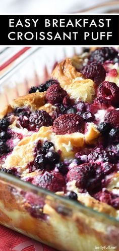 an easy breakfast croissant puff is in a glass dish on a red and white tablecloth