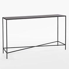 a black metal console table on a white background