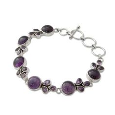 The lavish use of gemstones gives this bracelet an opulent elegance. By Neeru Goel it showcases amethyst's glorious purple tones in sterling silver. The faceted teardrops total 9 carats. .925 Sterling silver Round Amethyst Bracelets With Gemstone Accents, Adjustable Purple Bracelet With Gemstone Accents, Adjustable Amethyst Bracelets With Gemstone Accents, Amethyst Stone Bracelets, Silver Link Bracelet, Purple Tones, Trendy Fashion Jewelry, Sterling Bracelets, Amethyst Purple