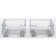 two metal baskets sitting next to each other on top of a white floor with wheels