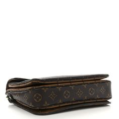 This is an authentic LOUIS VUITTON Reverse Monogram Pochette Metis. This handbag is crafted of Louis Vuitton monogram coated canvas in light and dark brown. The bag features a black leather top handle, an optional adjustable light brown monogram coated canvas shoulder strap, a rear exterior zipper pocket, and a V-shaped front flap with a brass S-lock. The flap opens to a partitioned black microfiber interior. Louis Vuitton Monogram Bag, Louis Vuitton Pochette Metis, Louis Vuitton Crossbody Bag, Black Leather Top, Louis Vuitton Crossbody, Louis Vuitton Empreinte, Louis Vuitton Pochette, Monogram Bag, Louis Vuitton Shoulder Bag