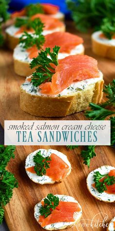 smoked salmon and cream cheese tea sandwiches on a wooden cutting board with parsley garnish