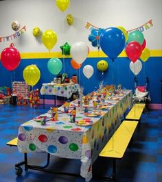 a birthday party with balloons and decorations