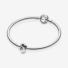 Tell your style story through our letter charms that let you spell out the words that mean the most to you. Monogram your Pandora Moments charm bracelet with important initials or create a personal message with the letter S. The reversible sterling silver charm is polished on the front and feature raised hearts and beads on the back. Add the letter A to your charm collection or gift it to someone that's got a special connection to the letter. - Pandora Letter S Alphabet Charm - Sterling silver Sterling Silver Charm Bracelet With Initials In Silver, Silver Initials Charms For Everyday, Personalized Silver Jewelry With Letter Print, Silver Charms With Initials For Everyday, Everyday Silver Charms With Initials, Sterling Silver Initial Letter Jewelry, Sterling Silver Initials Letter Jewelry, Elegant Silver Charms With Initials, Personalized Silver Jewelry With Letter Beads