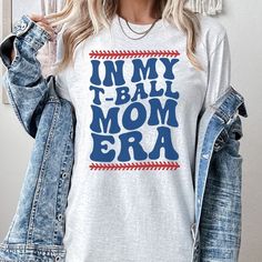 This IN MY T-BALL MOM ERA Bella and Canvas shirt is perfect for all those game days ahead!  This sports mom era t-shirt is a retro and trendy way to show your love for baseball season and your baseball mama season of life.  Buy for yourself or make this a Mother's Day or birthday gift for your favorite t-ball mom. PLEASE READ THROUGH ALL OF THE FOLLOWING INFORMATION.  IF YOU HAVE FURTHER QUESTIONS, WE ARE HAPPY TO HELP! Welcome to CuratedClothCo.!  Here you can find the perfect, trendy attire wh Team Mom Gifts, Gifts For Baseball Lovers, T Ball, Baseball Mama, Team Mom, Mom Era, Buying Process, Retro Game, Baseball Season