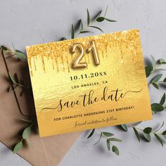 gold foil save the date card with greenery