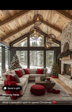 the living room is decorated for christmas with red and white decorations on the couches