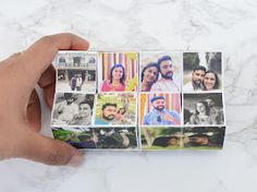 a hand holding up some photos with the words diy magic folding photo cubes