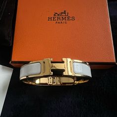 Hermes Luxury White Authentic Clic H Bracelet Blanc Color Bangle Comes With Dust Bag, Box And Bag Used Very Few Times In Excellent Condition Size Pm H Bracelet, Hermes Jewelry, White Bracelet, White Bracelets, Womens Jewelry Bracelets, Dust Bag, Bangles, Women Jewelry, Bracelet