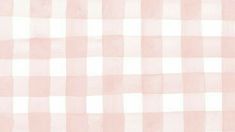 a pink and white checkered fabric with some small squares on it's side