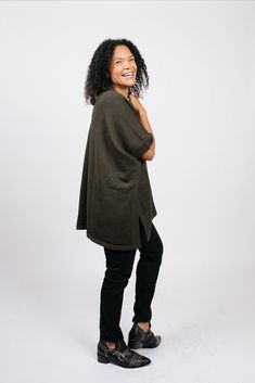 The Amanda poncho is a versatile and timeless piece that is perfect for fall and winter. While it feels like wearing a blanket, it looks runway chic. It's easy to throw on and instantly gives any simple outfit a stylish edge. We paired the poncho with a simple pair of jeans and a tank, and voila! A stylish fall outfit. When paired with the Zoe tank and the Denise skirt, this piece takes on a whole new look. And did we mention it is incredibly comfortable? Chic Oversized Poncho Cape, Chic Oversized Cape Poncho, Chic Oversized Cashmere Cape, One Size Cashmere Poncho For Fall, Cozy Oversized Cashmere Poncho, Cozy Oversized Cape For Cold Weather, Oversized Cozy Cashmere Poncho, Cozy Oversized Cashmere Cape, Oversized Cozy Cashmere Cape