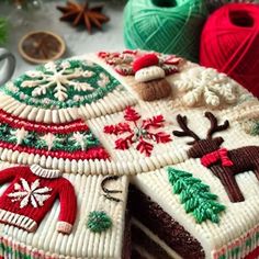 a cake decorated with christmas sweaters and decorations