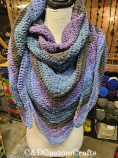 This beautiful Wild Oleander boho hooded scarf will keep you snug and warm all winter long. It is very soft and will fit most adults.  This would make a perfect gift for your loved ones or for yourself. Made with very soft acrylic yarn. Check us out on TikTok! We do lives while making orders. You may see your order being made live. https://www.tiktok.com/@christyrhoadsgeor?_t=8olPCsveu91&_r=1 Crochet Scoodie, Poncho Au Crochet, Crochet Hooded Scarf, Winter Poncho, Infinity Cowl, Boho Poncho, Soft Crochet, Hooded Scarf, Crochet Poncho