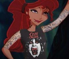 a woman with red hair and tattoos on her arm