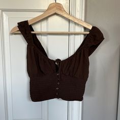 Super Cute Brown Top From Pacsun! Never Worn Size Xs Brown Summer Crop Top For Vacation, Summer Brown Crop Top For Vacation, Brown Casual Crop Top For Beach, Casual Brown Crop Top For Beach, Brown Sleeveless Crop Top For Vacation, Chic Brown Crop Top For Vacation, Brown Sleeveless Summer Crop Top, Brown Spring Beach Crop Top, Summer Vacation Brown Crop Top