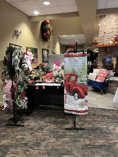 a room filled with christmas decorations and decorating on the walls, including an easel