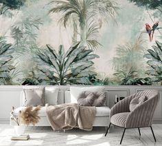 a living room filled with furniture and wallpaper covered in tropical plants on the walls