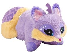 a purple and yellow stuffed animal laying down