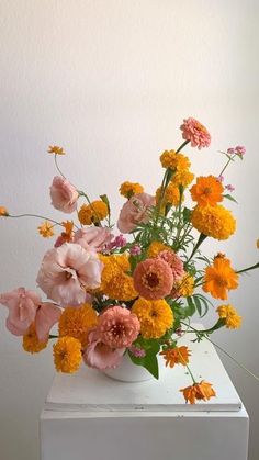 Marigold And Zinnia, Yasmine Mei Floral Design, 60s Flower Arrangements, Cosmos And Marigold Bouquet, Orange Marigold Bouquet, Orange Flower Decorations, Marigold Wedding Centerpieces, Cempasuchil Flower Arrangement, Pink Yellow Orange Flower Arrangement