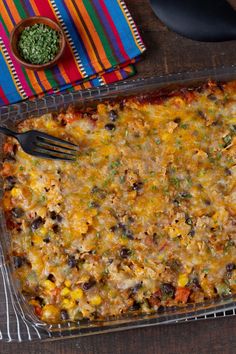 a casserole dish is shown with a fork in it