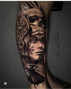 a man's arm with a tattoo on it and a skull in the middle