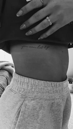 a woman's stomach with her hand on her hip and the words, i love you