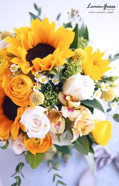 a bridal bouquet with sunflowers and roses