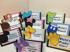 several mickey mouse and minnie mouse themed cards