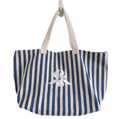 New Blue Striped Beach Tote Bag From Sisley-Paris Cosmetics Made Of Recycled Cotton And Polyester Embroidered Sisley Logo At Front Of Bag And Pouch Comes With Matching Zippered, Lined Pouch Bag Has 2 Top Handles And A Interior Zippered Pocket Approximate Measurements: Bag: 21” L X 13” H X 7” W; Strap Drop: 8-1/2” Pouch: 8” L X 5” H X 0.5” W New, Never Used Comes From A Smoke And Pet Free Home Fast Shipping Top Rated Seller Posh Ambassador Reasonable Offers Accepted Blue Canvas Bag For The Beach, Cream Canvas Beach Bag For Summer, Blue Canvas Bag For Summer, Summer Blue Canvas Bag, Blue Canvas Bag For Everyday Use In Summer, Cream Canvas Beach Bag, Blue Tote Canvas Bag For Beach, Blue Beach Bag For Everyday Summer Use, Blue Summer Beach Bag For Everyday Use