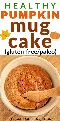 healthy pumpkin mug cake in a white bowl with a wooden spoon and title overlay