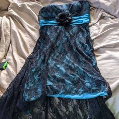 Beautiful Blue Dress With Black Lace. Ribbon Ties In Back. Has Removable Flower Pin In Front. 69.00 Originally From Macy's. Size Large Girls But A Small Adult Could Wear Also. Hawaiian Hoco Dress, Y2k Hoco Dress, Dresses For Middle School Dances, Emo Dress, Black Lace Ribbon, Bridesmaids Gowns, Descendants 1, Black Dress Style, Fit Checks